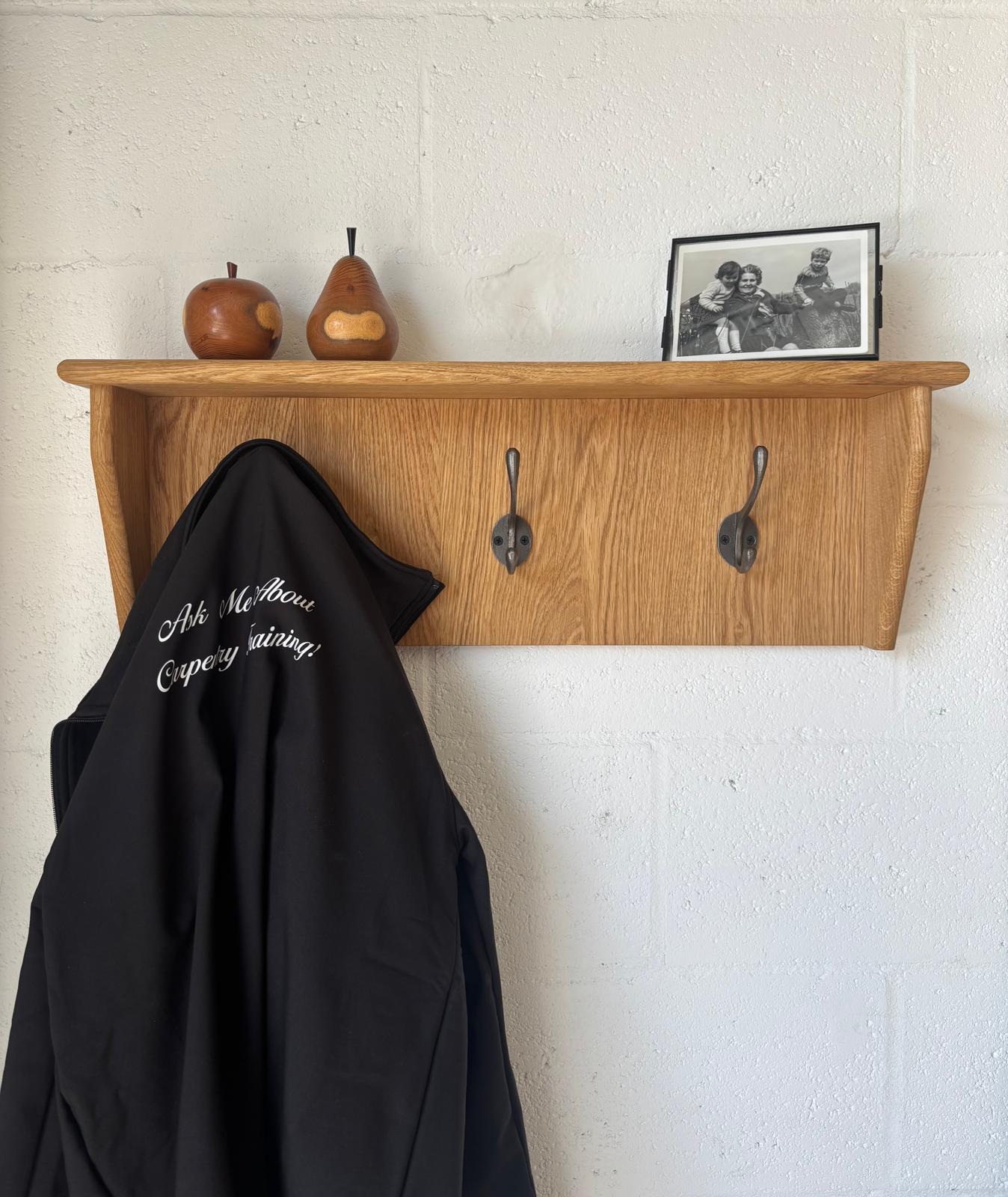 Hallway shelf with coat hooks